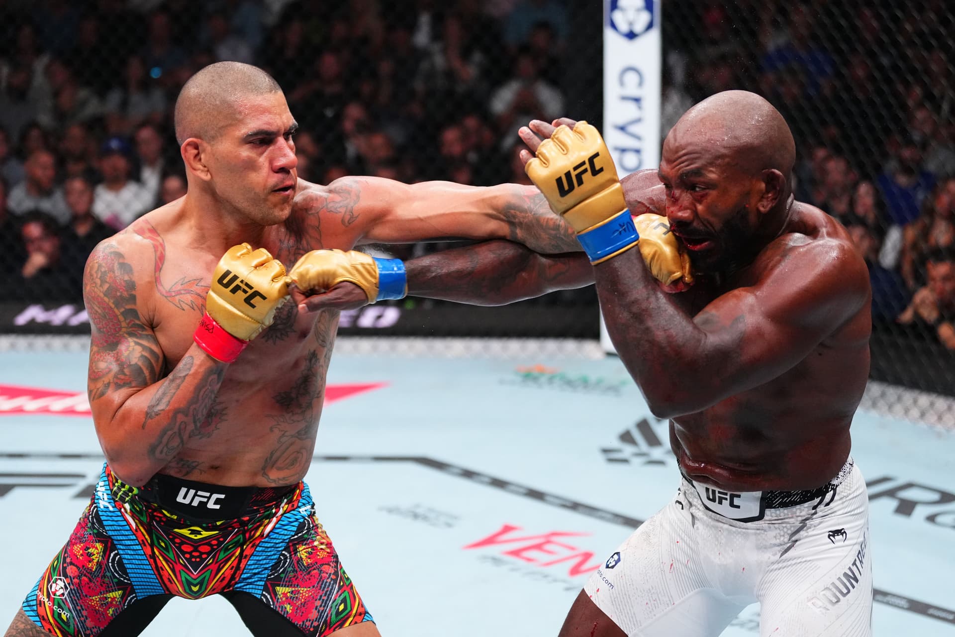 Alex Pereira of Brazil punches Khalil Rountree Jr. in the UFC light heavyweight championship
