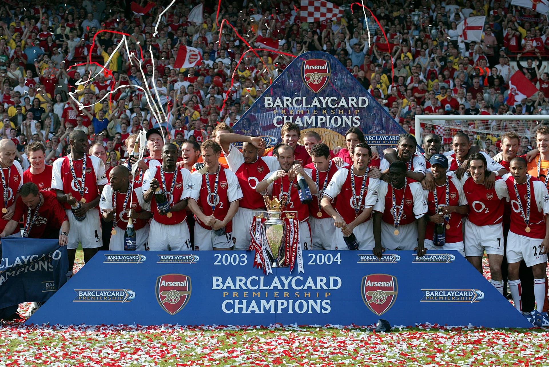 Arsenal players celebrate with Premiership trophy