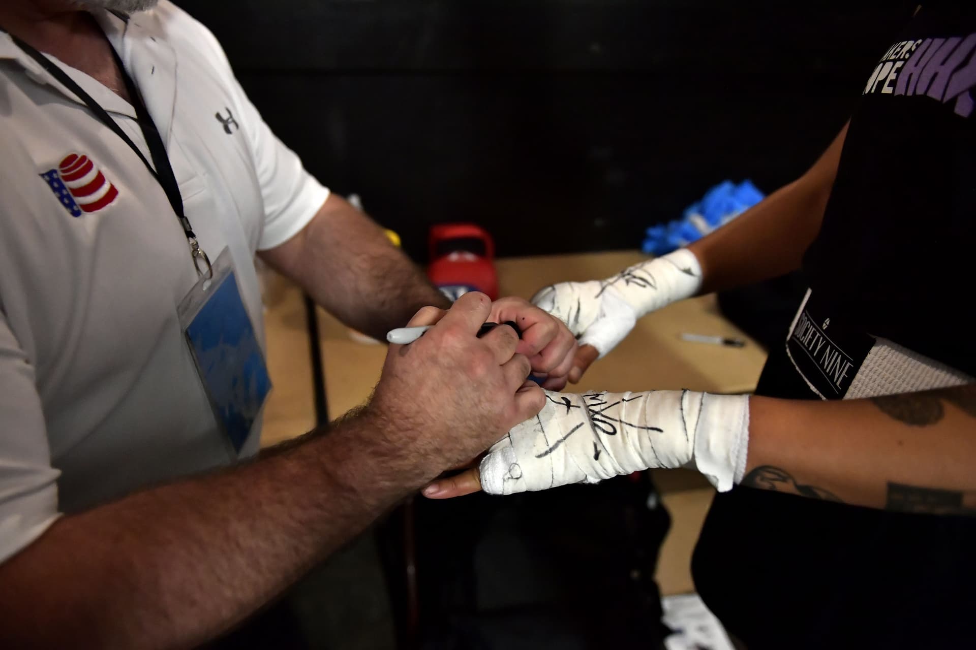 Boxers wrapping their hands