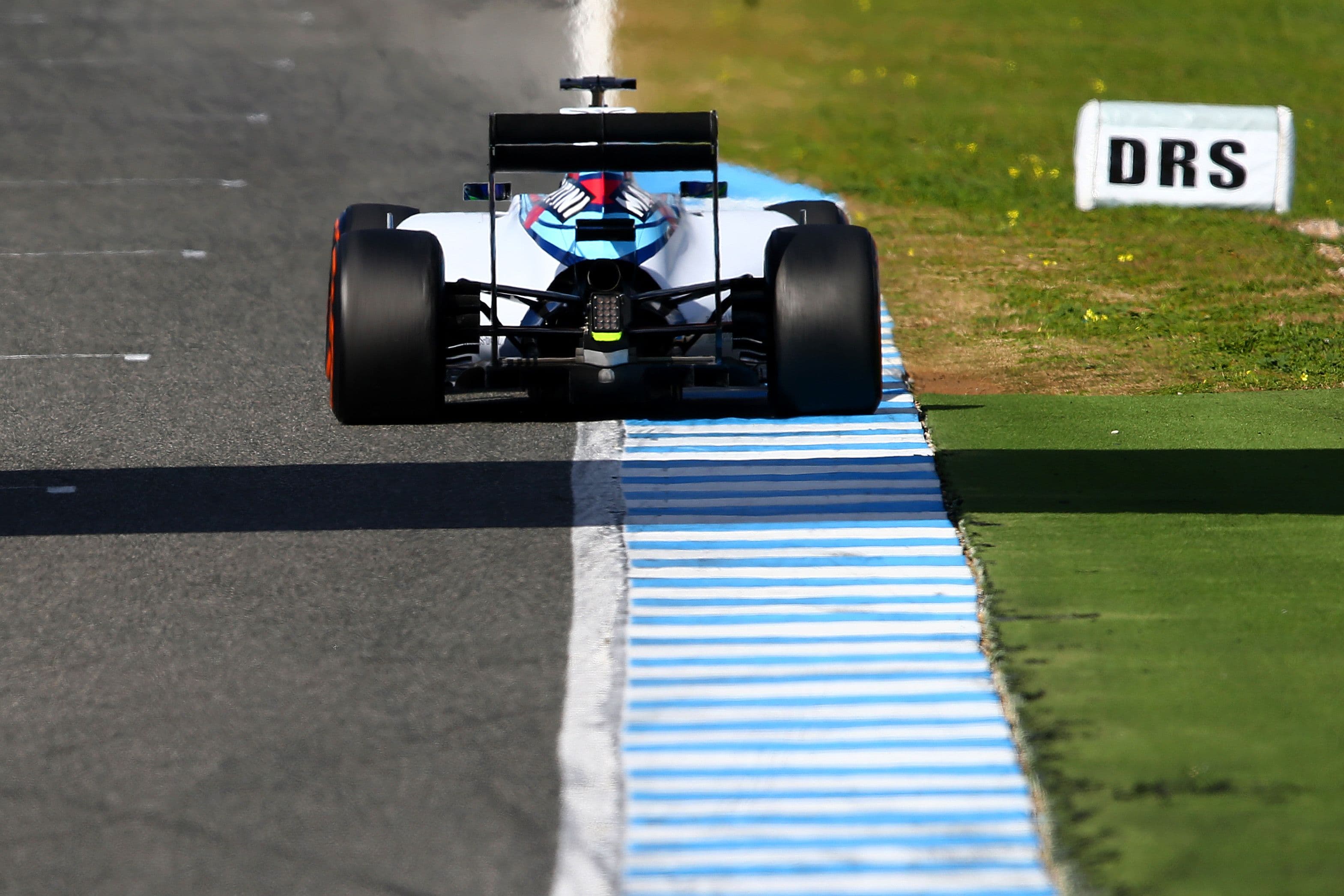 Felipe Massa of Brazil and Williams approaches a DRS sign indicating the start of a DRS zone