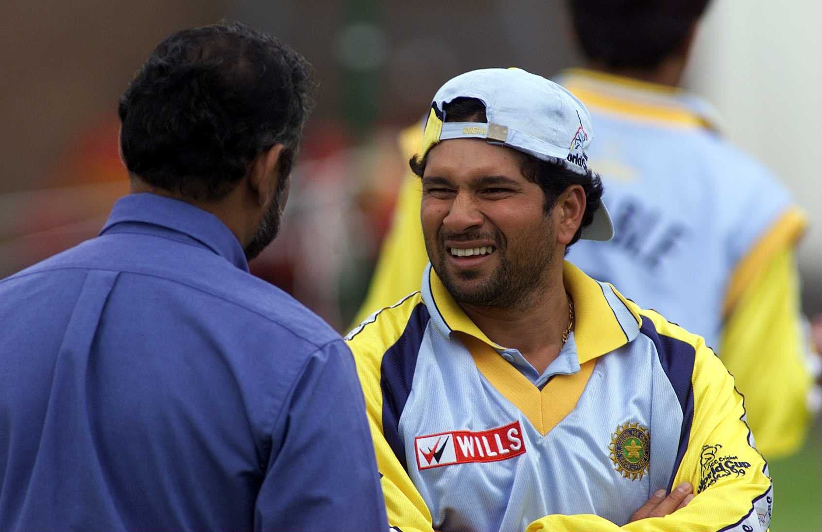 Sachin Tendulkar of India talks with manager Brijesh Patel