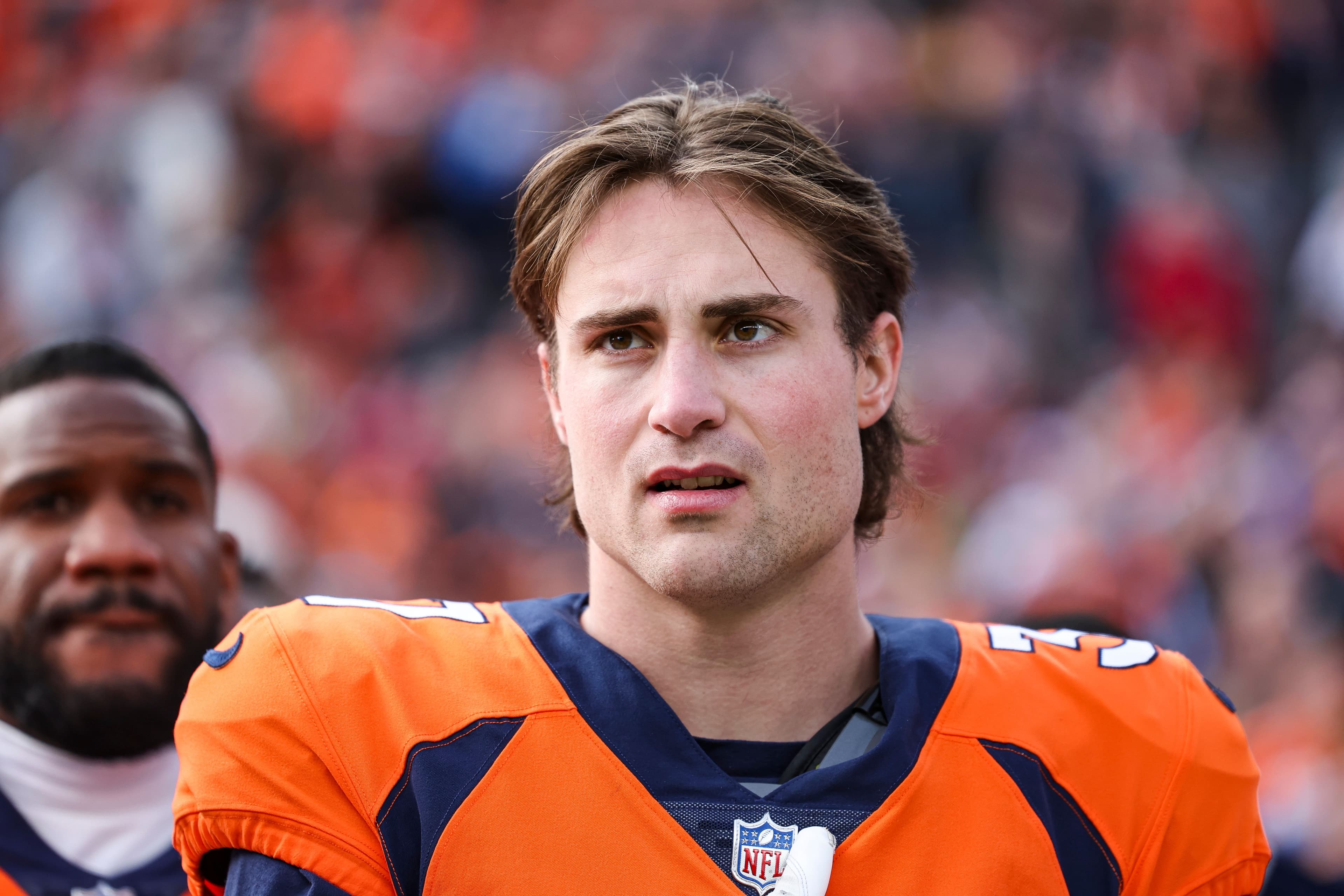 Riley Moss #37 of the Denver Broncos looks