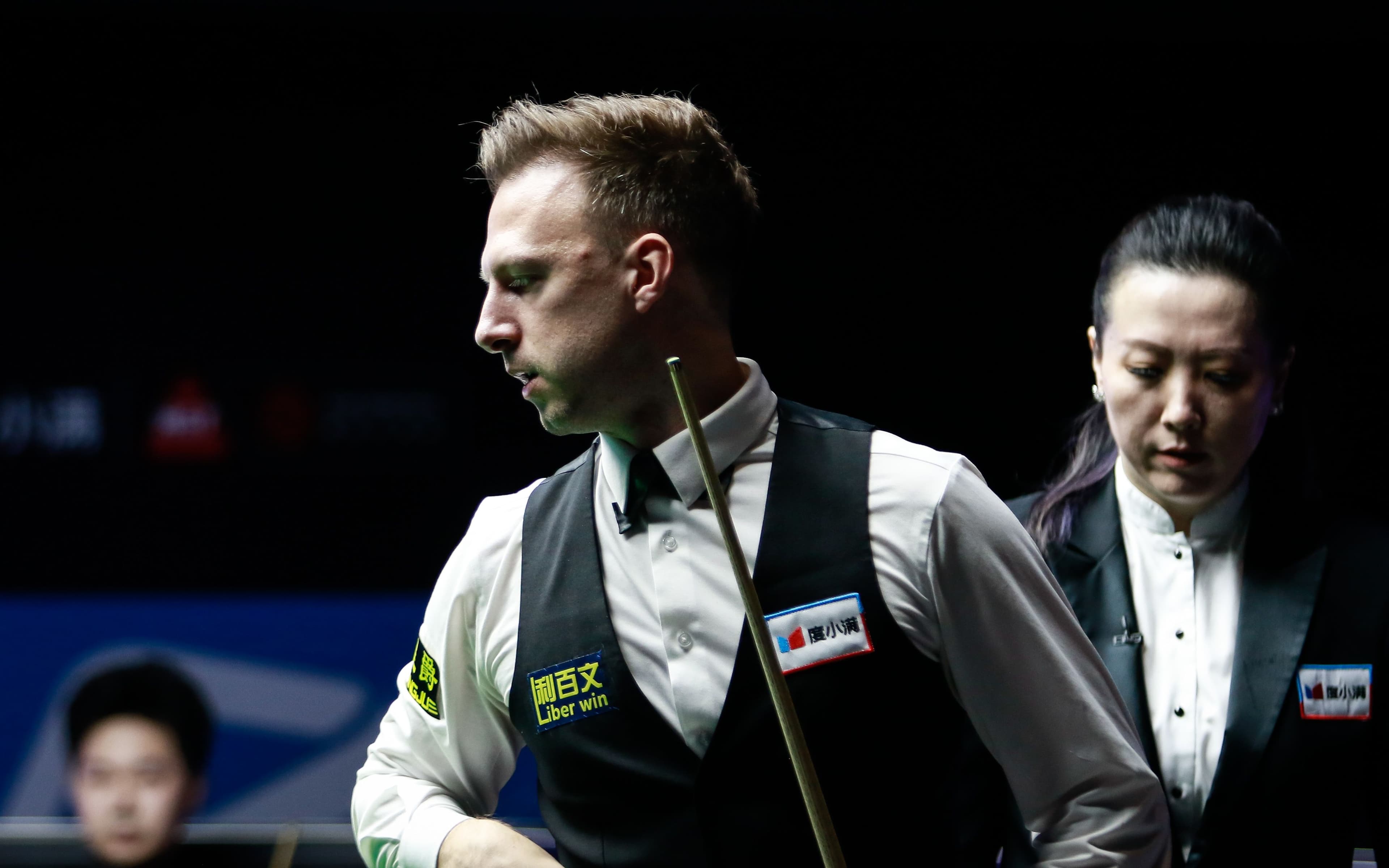 Judd Trump of England reacts in the third round