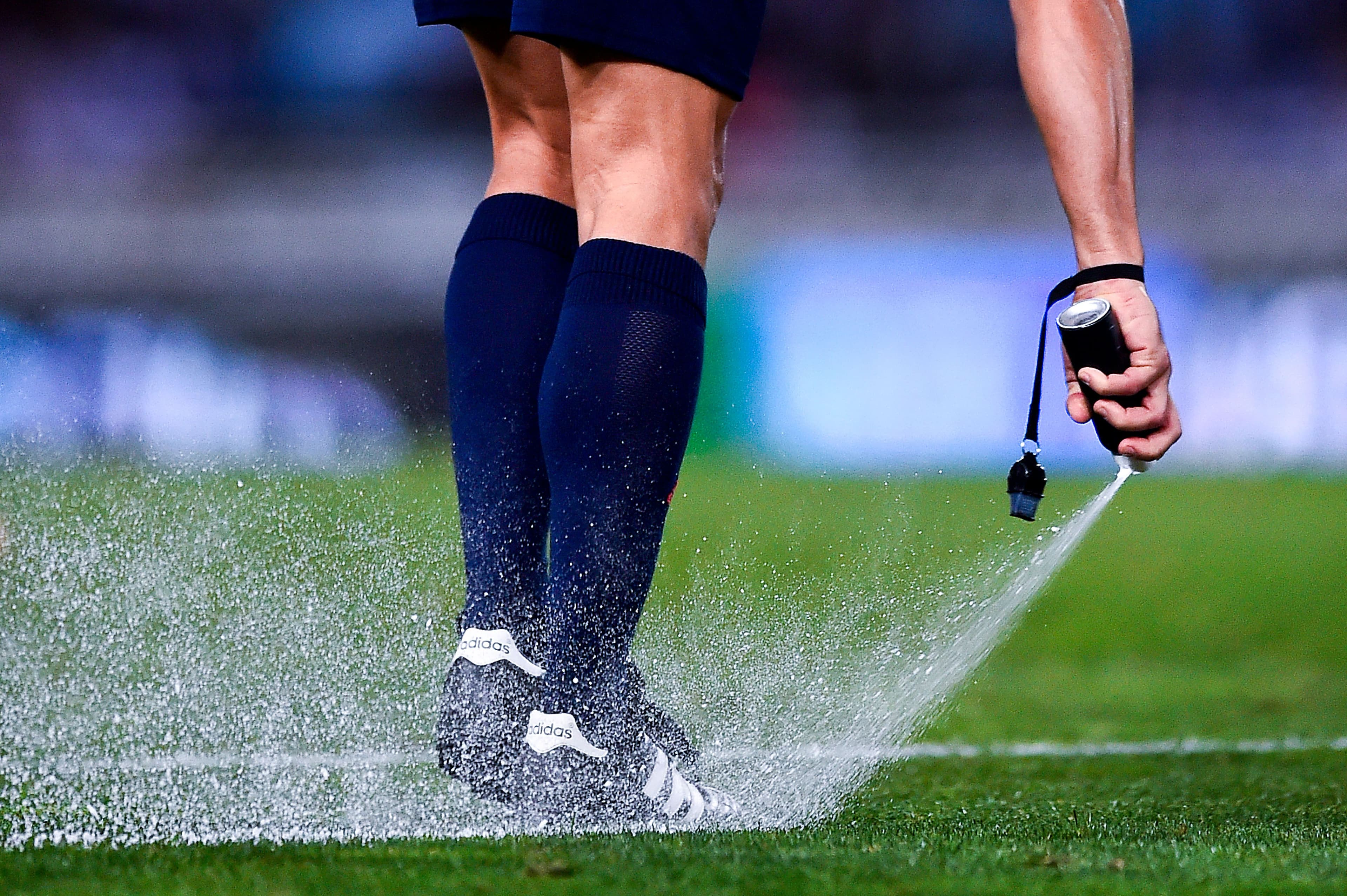 Referee Velasco Carballo uses vanishing spray