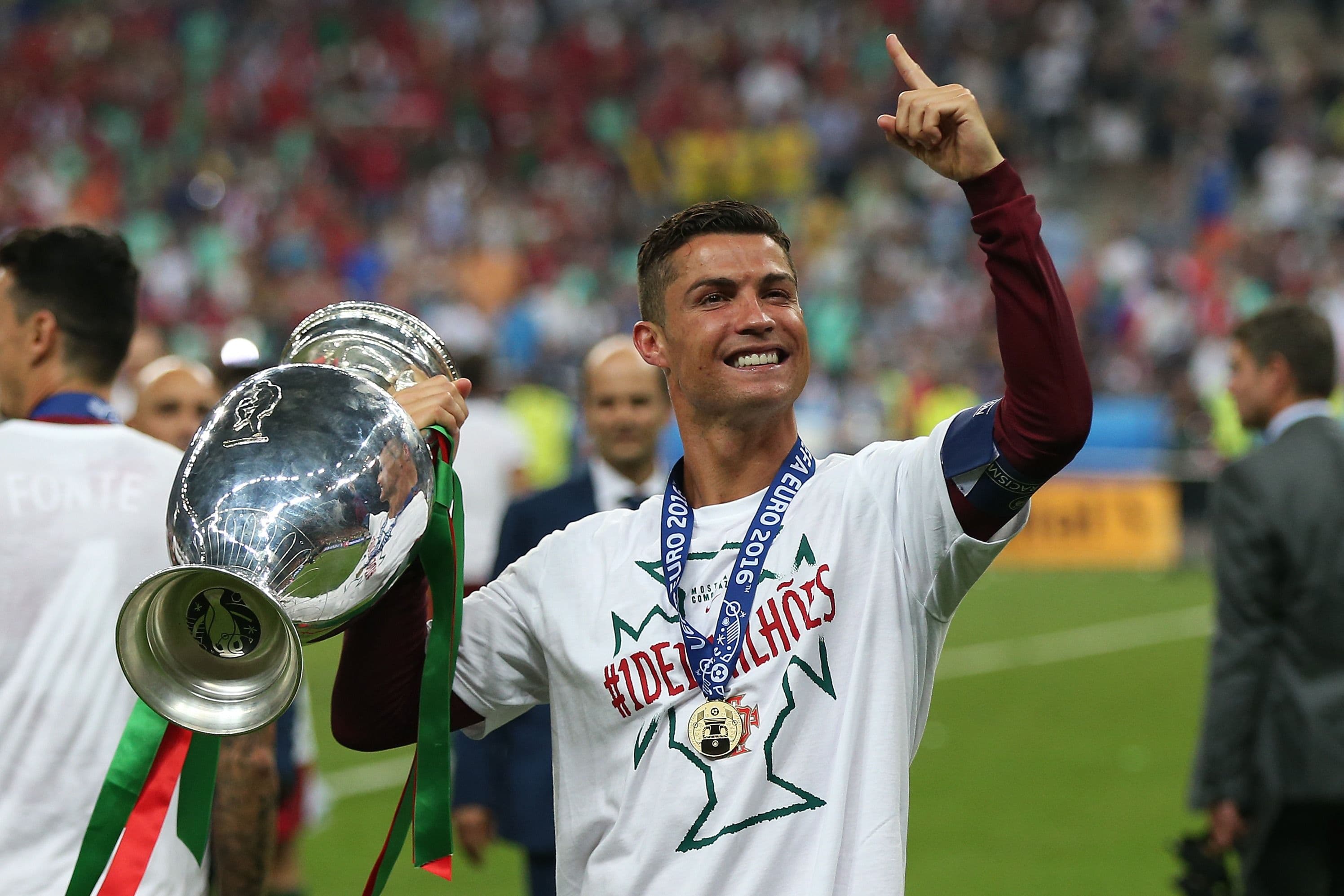 Cristiano Ronaldo of Portugal celebrates with the trophy following the UEFA Euro 2016 Final