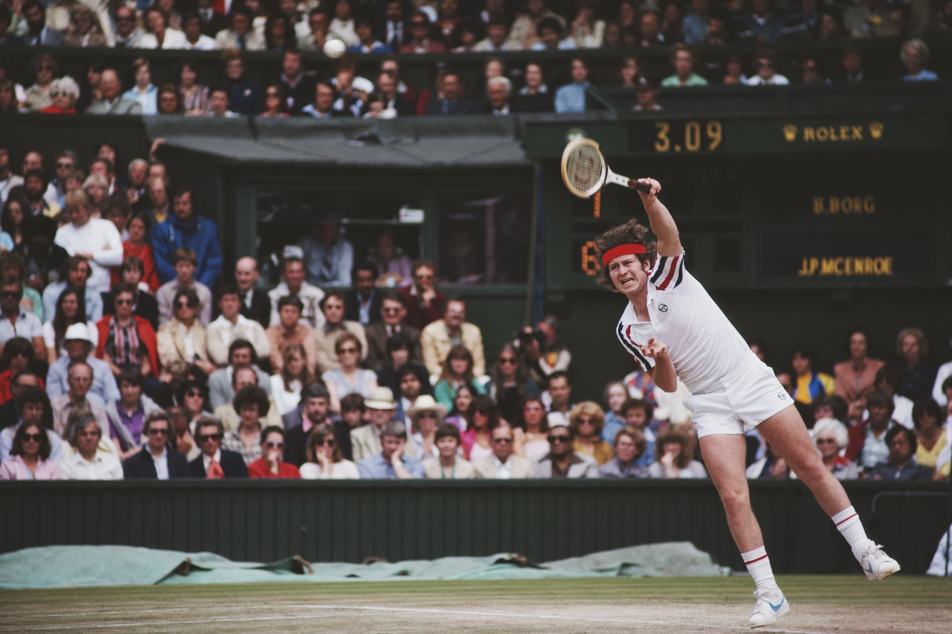 John McEnroe of the United States serves to Bjorn Borg of Sweden