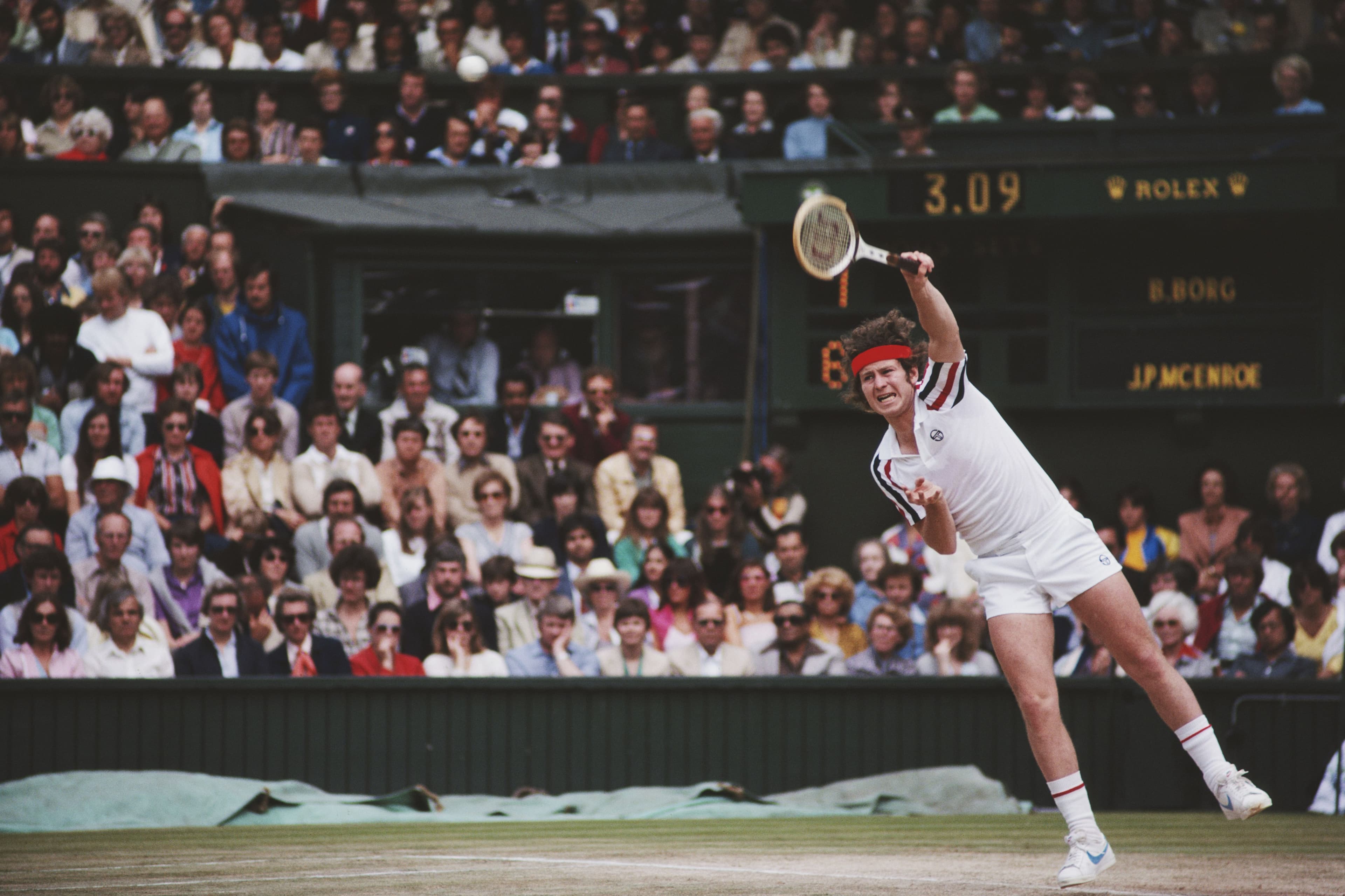 John McEnroe of the United States serves to Bjorn Borg of Sweden
