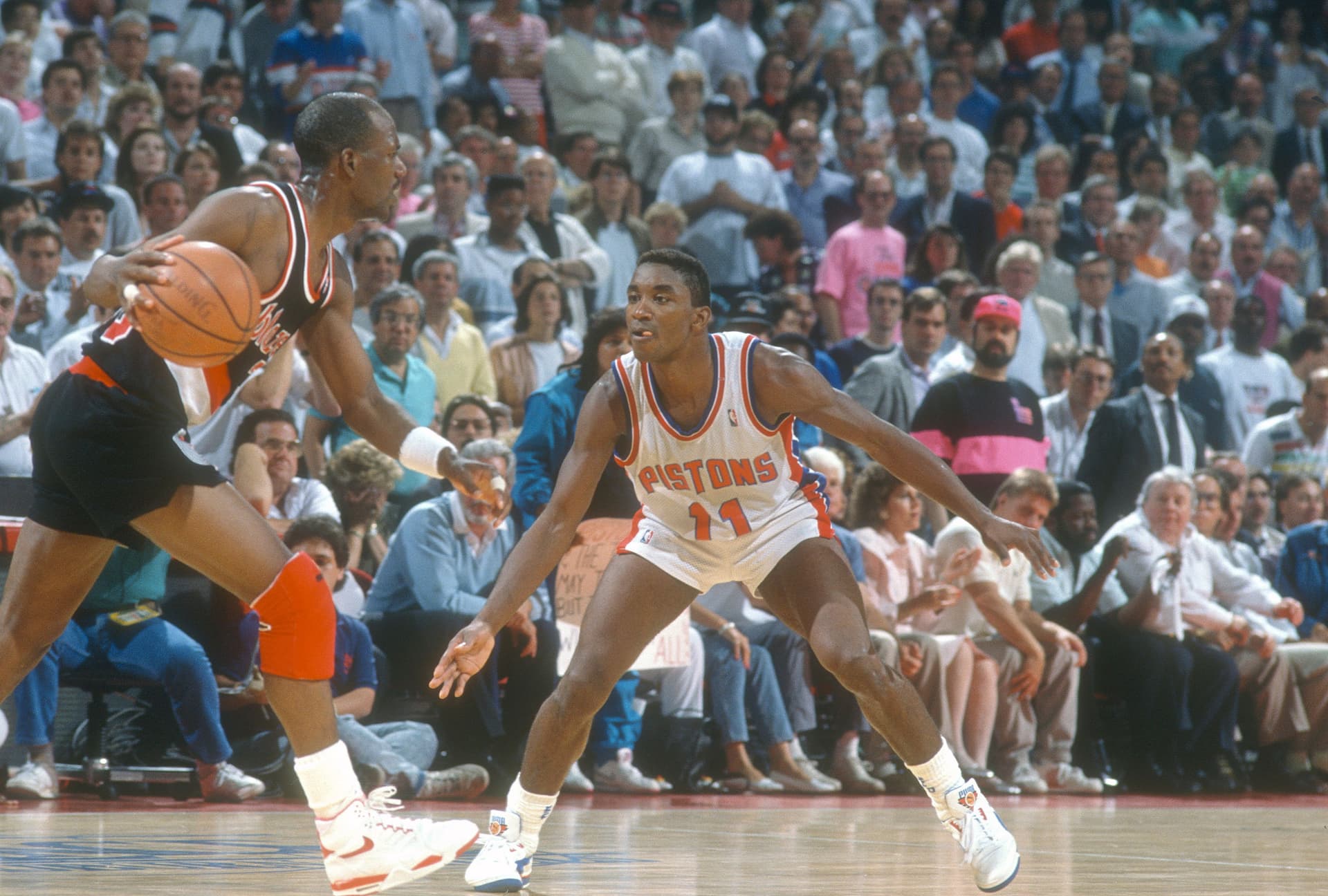 Isiah Thomas of the Detroit Pistons guards Terry Porter