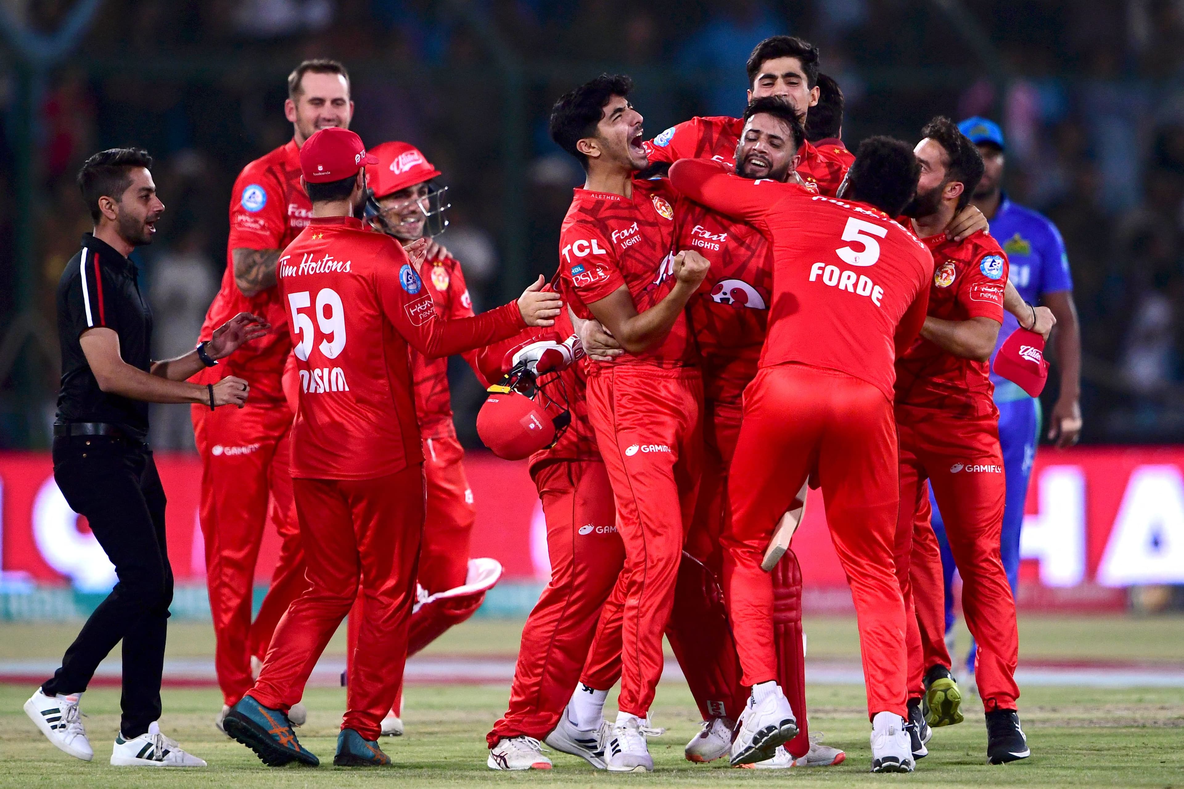 Islamabad United's players celebrate their victory