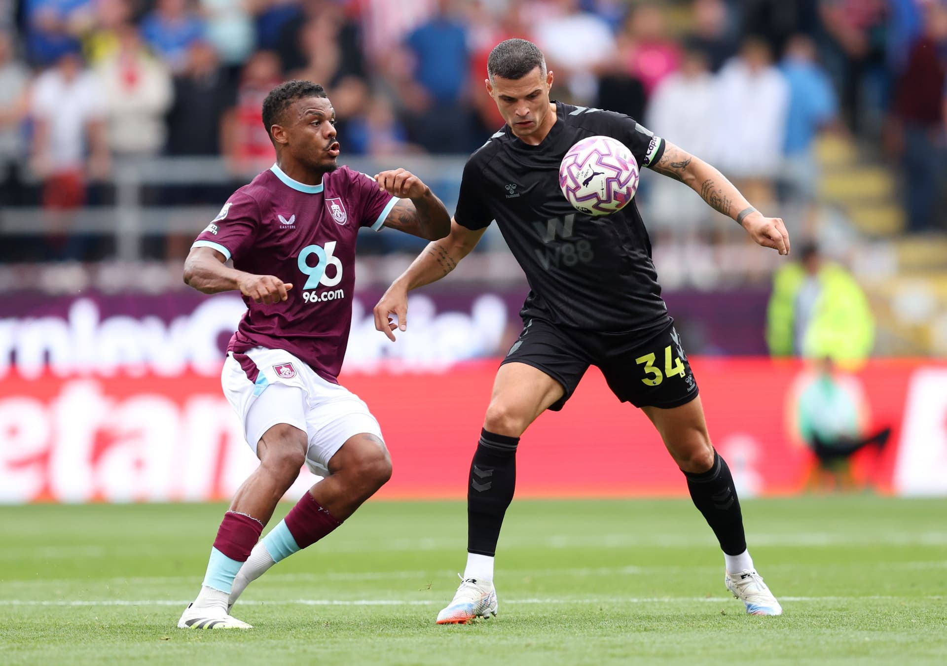 Lyle Foster of Burnley battles for possession with Granit Xhaka