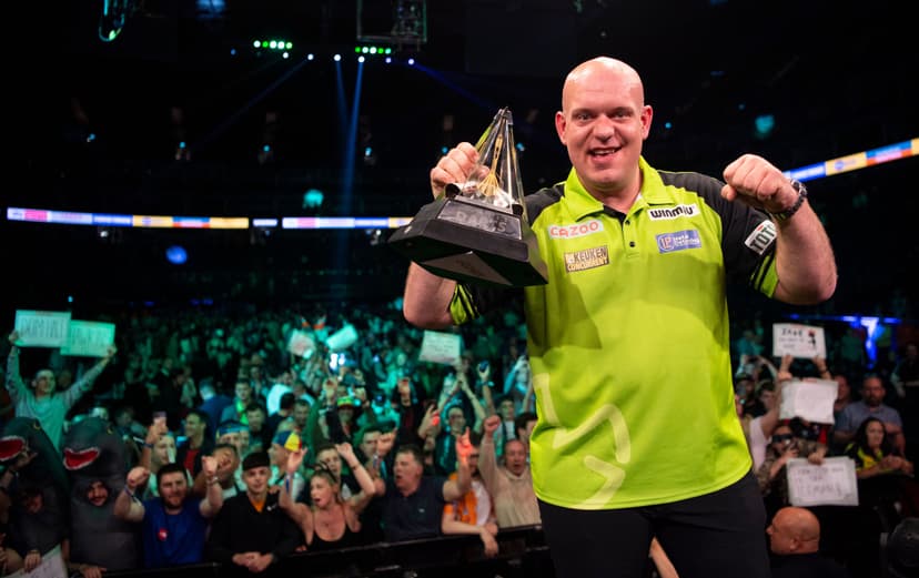 Michael Van Gerwen of Netherlands celebrates lifting the trophy.jpg
