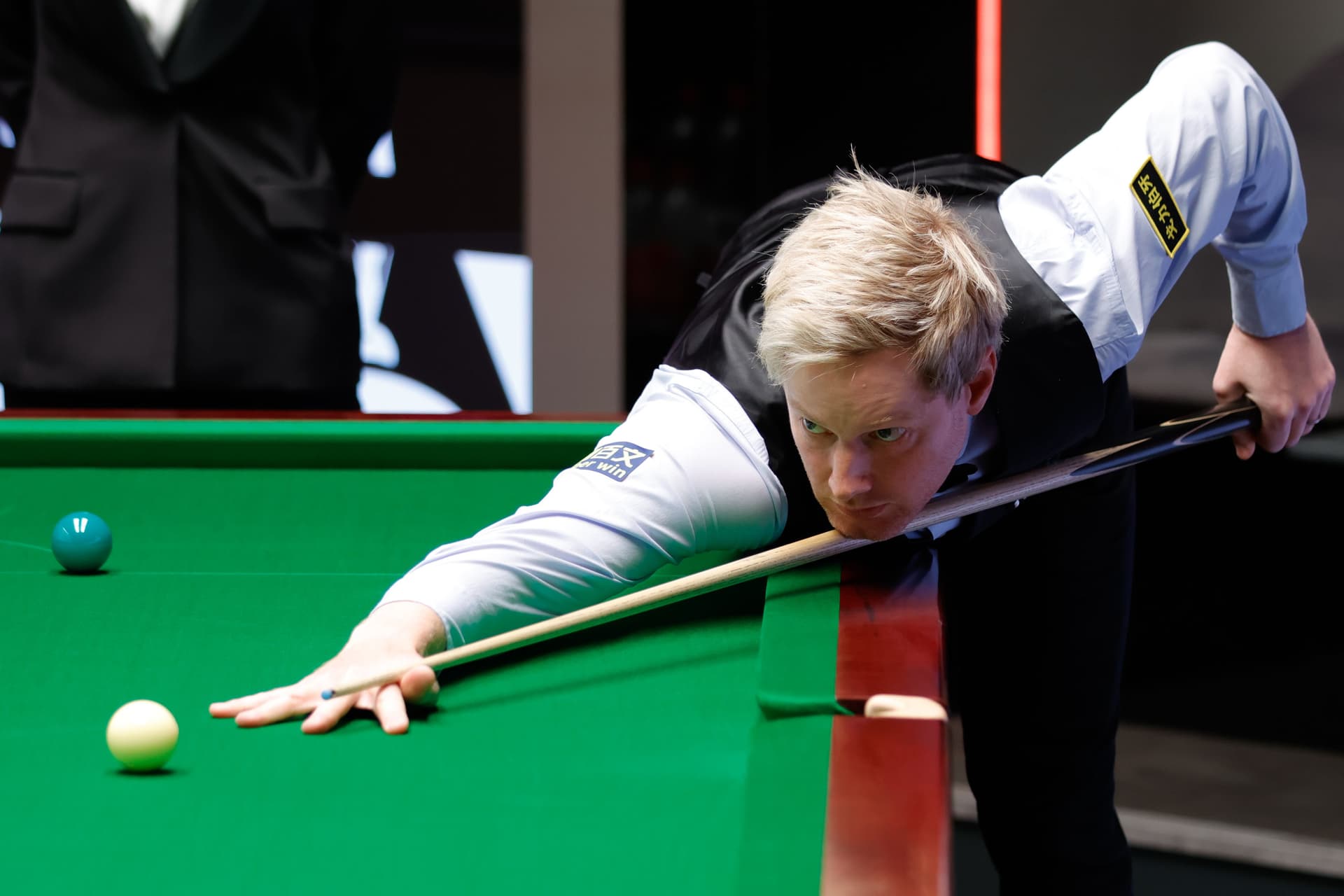 Neil Robertson of Australia plays a shot