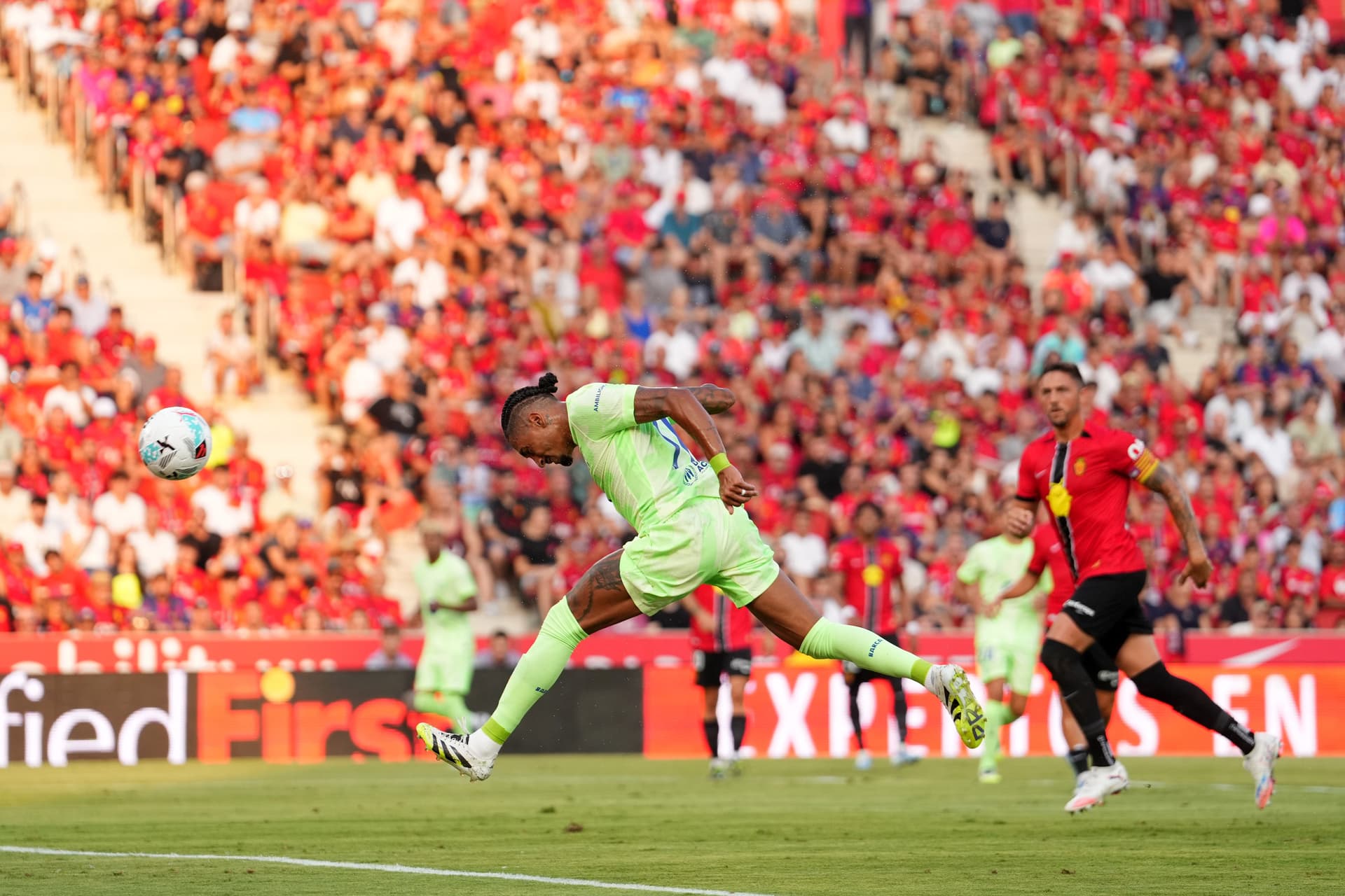 Raphinha of FC Barcelona scores his team's first goal during the LaLiga EA Sports match