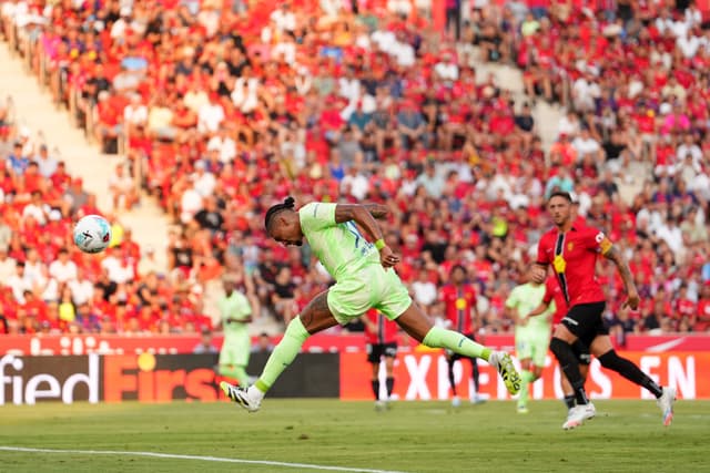 Raphinha of FC Barcelona scores his team's first goal during the LaLiga EA Sports match