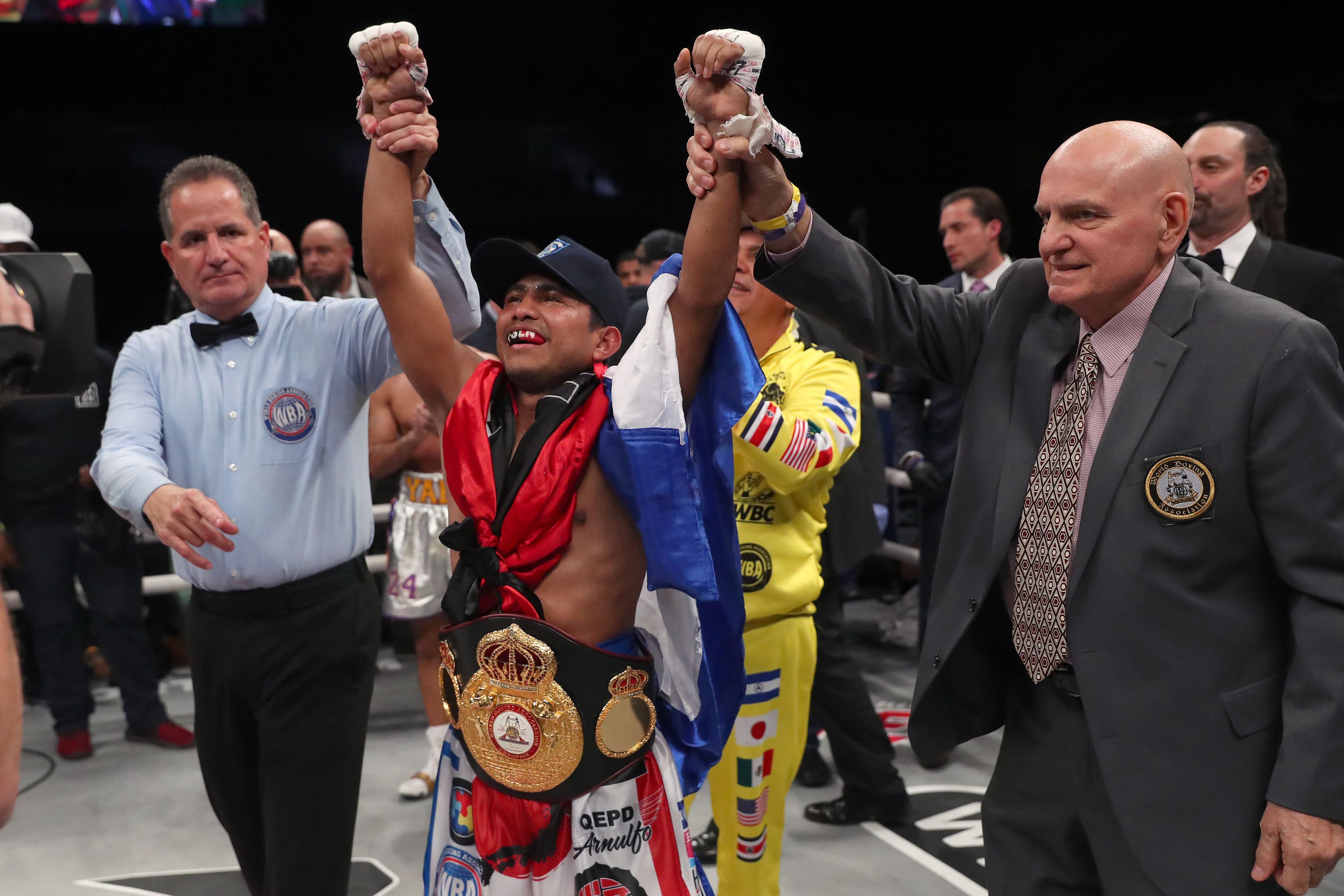 Roman Gonzalez celebrates after beating Khalid Yafai in an eighth round TKO in a WBA Super Flyweight World Championship