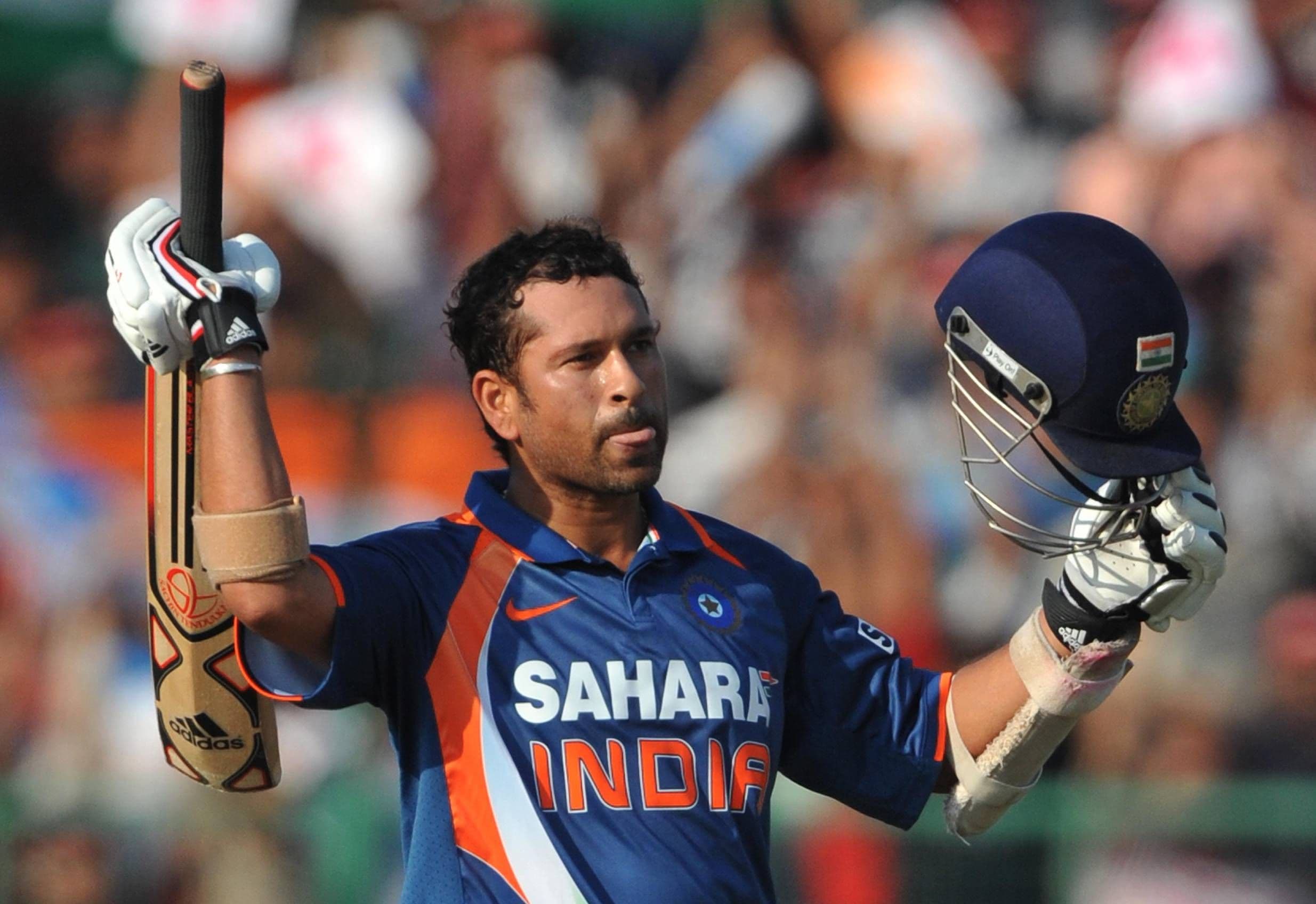Sachin Tendulkar celebrates his 100