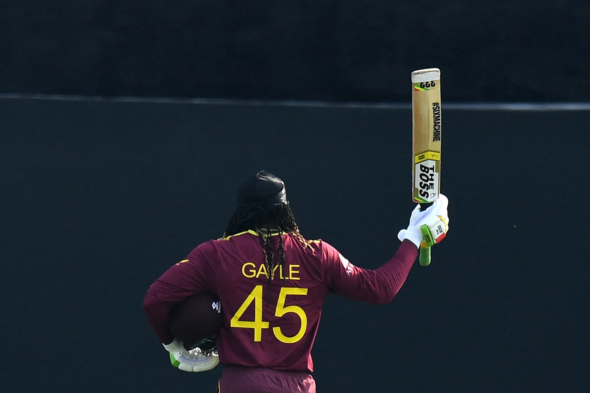 West Indies' Chris Gayle gestures as he walks back to the pavilion