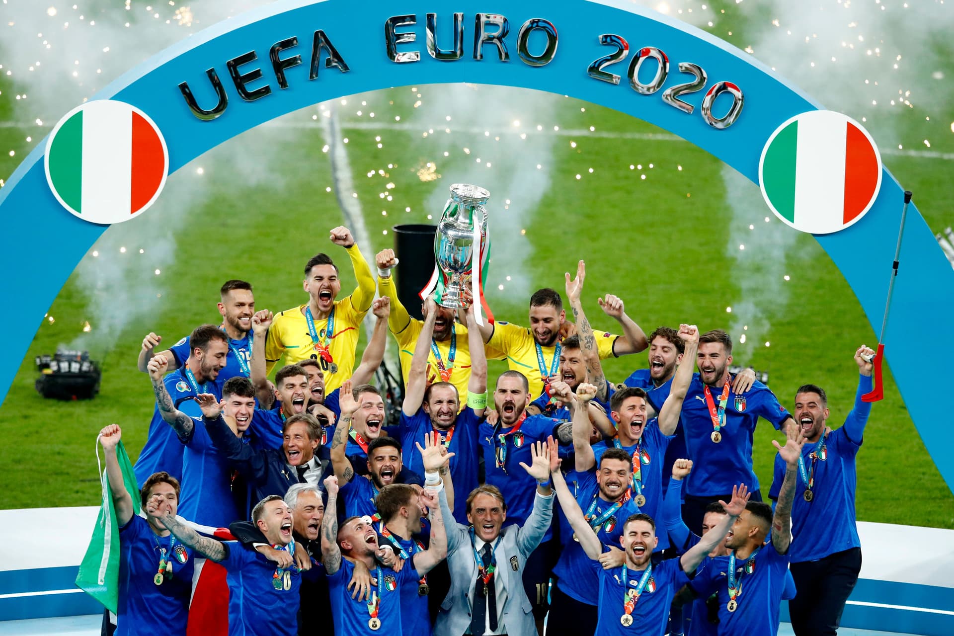 Players of Italy celebrate with the trophy